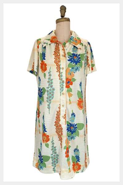 1970s Leslie Pomer shirt dress in a relaxed tropical vibe print with button front | large