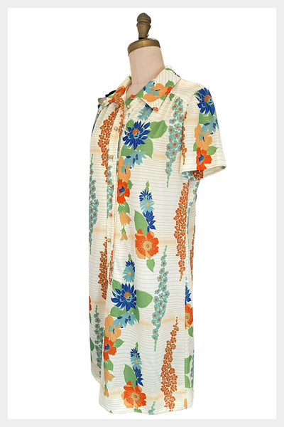 1970s Leslie Pomer shirt dress in a relaxed tropical vibe print with button front | large