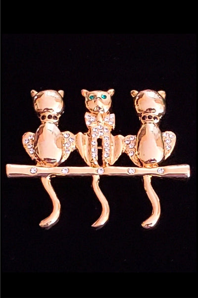 1960s gold tone and rhinestone cat brooch