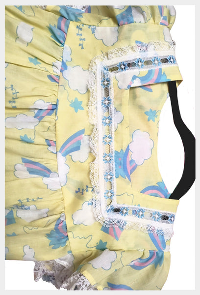 1970s yellow novelty print nightgown with rainbows, clouds, kites and suns | size small