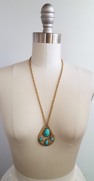 Funky 1970s faux turquoise pendant on a 24” gold tone chain link necklace